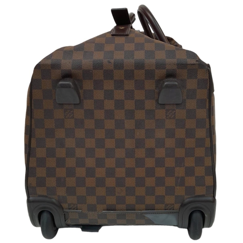 17 - A Louis Vuitton Damier Ebene Eole Convertible Travel Bag. Leather exterior with gold-toned hardware,... 