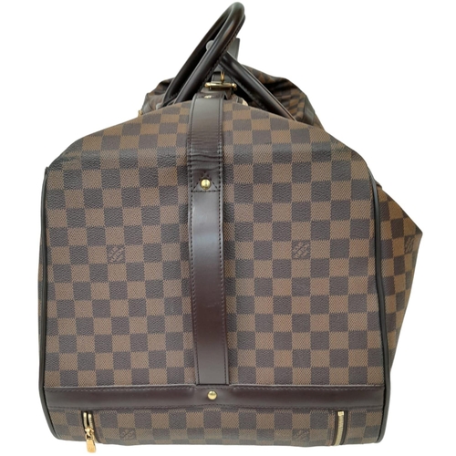 17 - A Louis Vuitton Damier Ebene Eole Convertible Travel Bag. Leather exterior with gold-toned hardware,... 