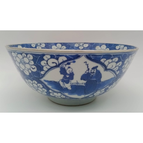 282 - A LARGE CHINESE BLUE AND WHITE BOWL PAINTED WITH ANCIENT CHINESE FIGURES AND HAVING EXQUISITE WORKMA... 