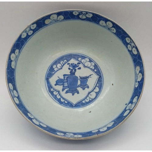 282 - A LARGE CHINESE BLUE AND WHITE BOWL PAINTED WITH ANCIENT CHINESE FIGURES AND HAVING EXQUISITE WORKMA... 