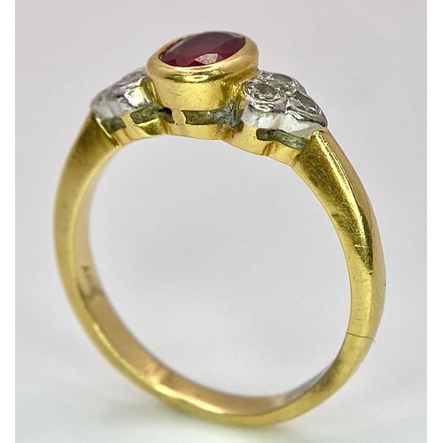 32 - An 18K Yellow Gold Ruby and Diamond Ring. Central oval ruby with six round cut diamond accents. Size... 