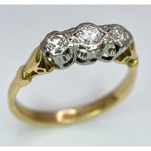 524 - A VINTAGE 18K YELLOW GOLD & PLATINUM 3 STONE SET DIAMOND RING, WEIGHT 2.3G SIZE I, APPROX 0.20CT DIA... 