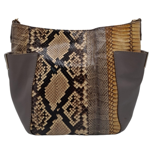 60 - A Jimmy Choo Taupe Snakeskin Crossbody Bag. Snakeskin and leather exterior with gold-toned hardware,... 