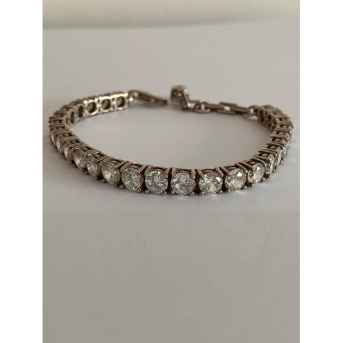 776 - SILVER TENNIS BRACELET set with 28 Round Cut Sparkling Zirconias. 19 cm.