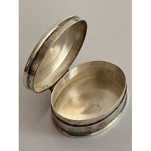 818 - Vintage SILVER PILL BOX. Full hallmark. Oval form with patterned border.4 cm x 3 cm. Excellent condi... 