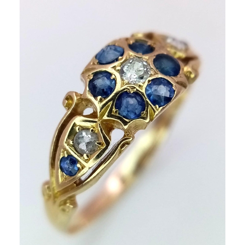 89 - AN ANTIQUE 18K GOLD OLD CUT DIAMOND AND SAPPHIRE RING .   2.6gms   size Q