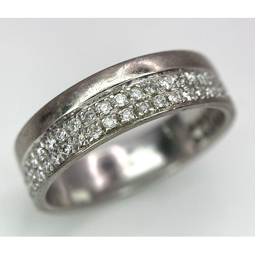 109 - 18K WHITE GOLD DIAMOND SET BAND RING, DOUBLE ROWS OF 0.30CT DIAMONDS APPROX, WEIGHT 4.1G SIZE K, REF... 