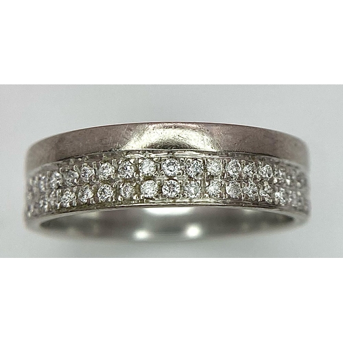 109 - 18K WHITE GOLD DIAMOND SET BAND RING, DOUBLE ROWS OF 0.30CT DIAMONDS APPROX, WEIGHT 4.1G SIZE K, REF... 