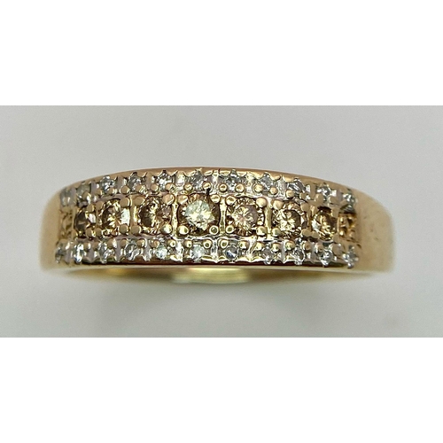 151 - A 9K YELLOW GOLD DIAMOND & CHAMPAGNE DIAMONDS SET 3 ROW RING 0.25CT 3.7G SIZE V 1/2

SC 4004