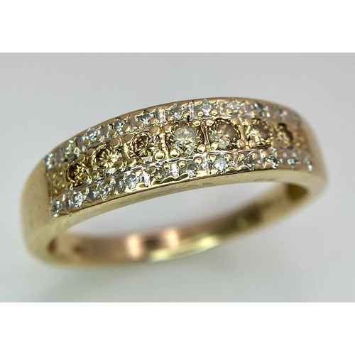 151 - A 9K YELLOW GOLD DIAMOND & CHAMPAGNE DIAMONDS SET 3 ROW RING 0.25CT 3.7G SIZE V 1/2

SC 4004