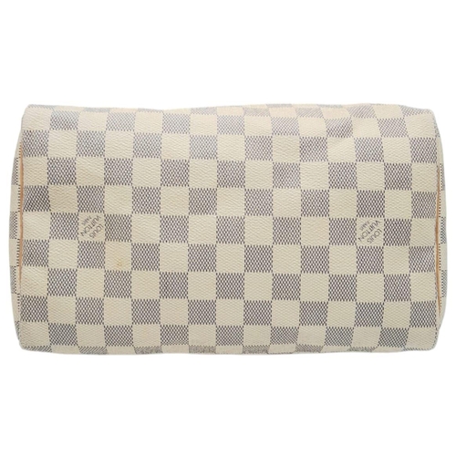 178 - A Louis Vuitton White Canvas Damier Azur Speedy Handbag. Leather exterior, Rolled leather handles, a... 