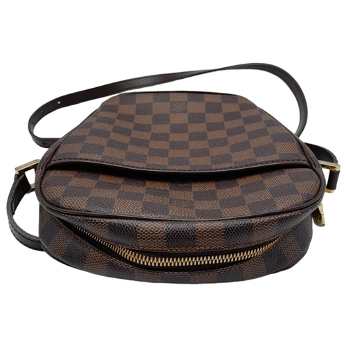 191 - A Louis Vuitton Damier Ebene 'Ipanema' Crossbody Bag. Leather exterior with gold-toned hardware, ope... 