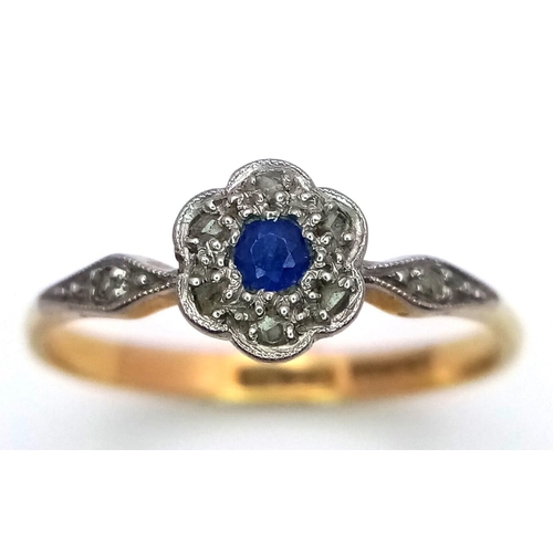 348 - A VINTAGE 18K GOLD SAPPHIRE AND DIAMOND RING WITH PLATINUM SETTING .   1.9gms   size O