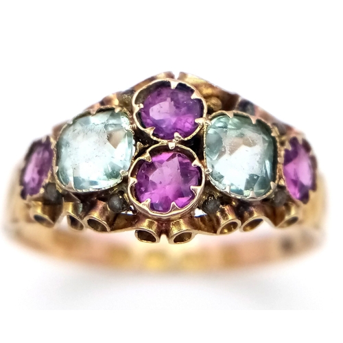 409 - An Antique George IV, 12K Gold, Ruby and Aquamarine Ring. Four bright pink rubies and two ice blue a... 