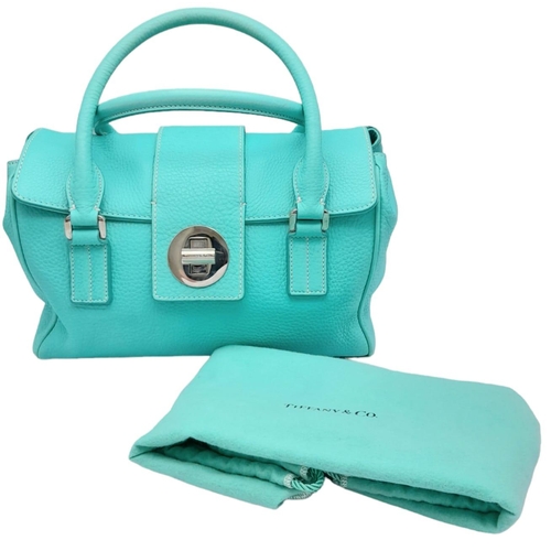 43 - A Tiffany & Co. 'Manhattan' Satchel Handbag. The iconic 'Tiffany blue' leather exterior with silver-... 