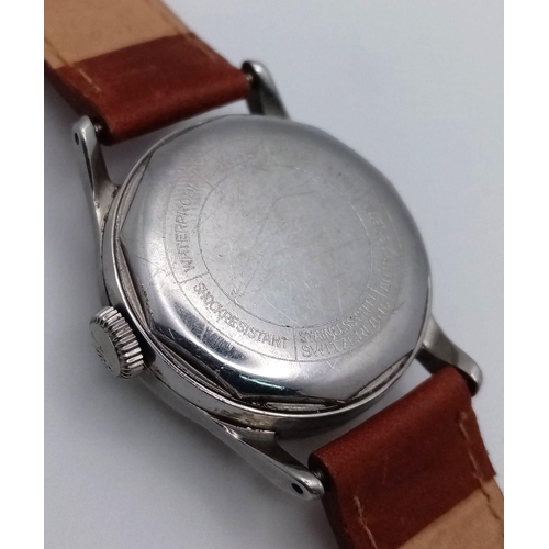 5 - A Vintage Mido Multifort Powerwind Gents Automatic Watch. Brown leather strap. Stainless steel case ... 