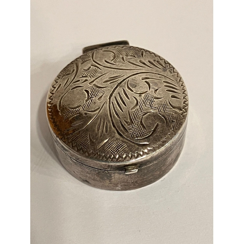 755 - 2 x Vintage SILVER PILL BOXES. To include oval and round shapes. Both having decorated lids and full... 