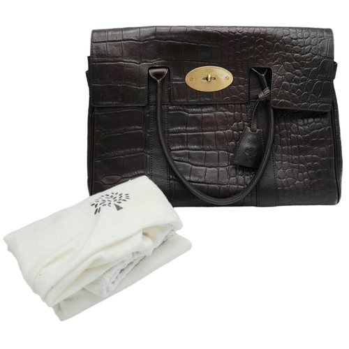 88 - A Mulberry Chocolate 'Bayswater' Handbag. Croc embossed leather exterior with gold-toned hardware, t... 