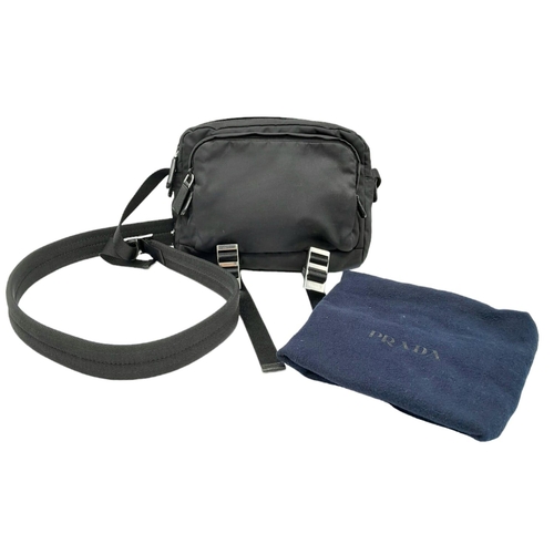 124 - A Prada Black 'Tessuto Montagna' Crossbody Bag. Textile exterior with silver-toned hardware, a padde... 