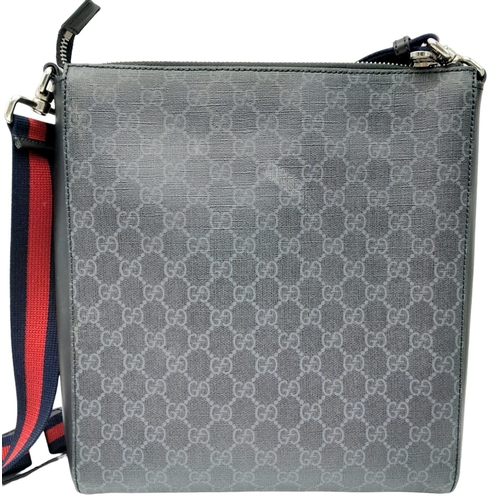 171 - A Gucci Monogram Night Courier Messenger Bag. Leather exterior with patch details, silver-toned hard... 