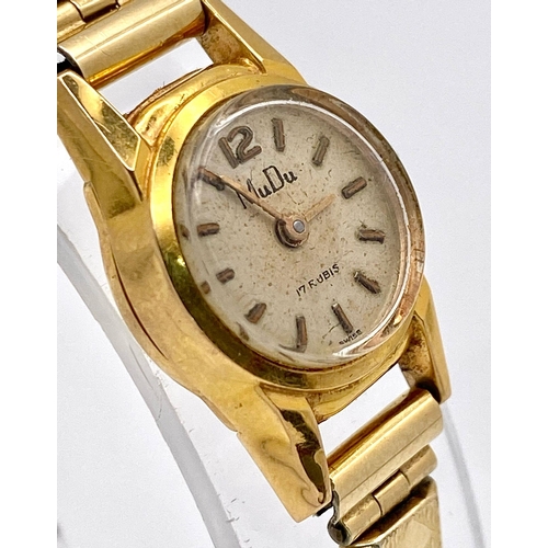 237 - A VINTAGE 18K GOLD MUDU LADIES WRISTWATCH ON A GOLD PLATED EXPANDABLE STRAP , IN GOOD WORKING ORDER ... 