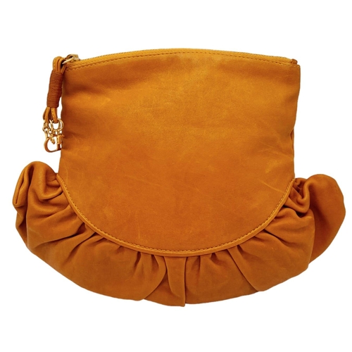 253 - A Christian Dior Caramel Ruffled Clutch Bag. Leather exterior with gold-toned hardware and a zipped ... 