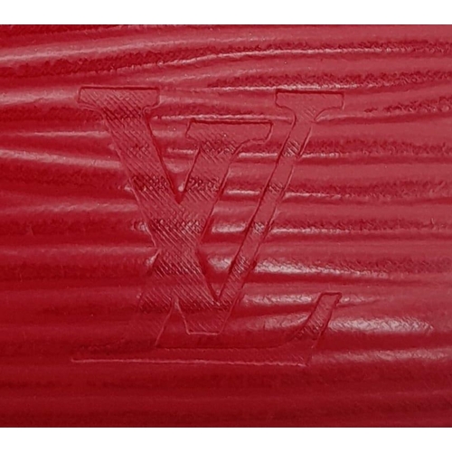 367 - A Louis Vuitton Castillan Red Epi Leather French Purse Wallet. Epi Leather Exterior with the LV logo... 