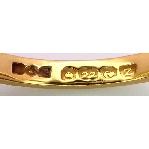 479 - A 22K Yellow Gold Band Ring. 3mm width. Size M 1/2. 3.25g weight.