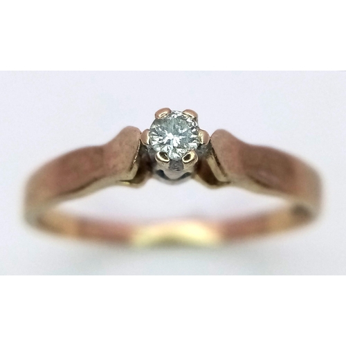 530 - A Vintage 9K Yellow Gold Diamond Solitaire Ring. 0.10ct.
Size K. 1.25g total weight.