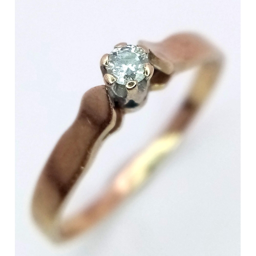 530 - A Vintage 9K Yellow Gold Diamond Solitaire Ring. 0.10ct.
Size K. 1.25g total weight.