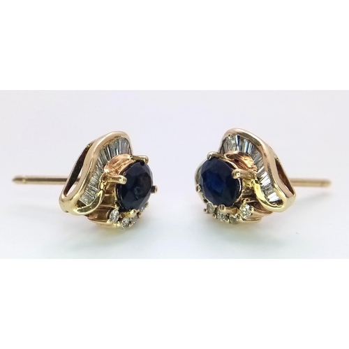 82 - A PAIR OF 14K GOLD DIAMOND AND SAPPHIRE STUD EARRINGS WITH .50ct DIAMONDS AND 1.5ct OVAL SAPPHIRES .... 