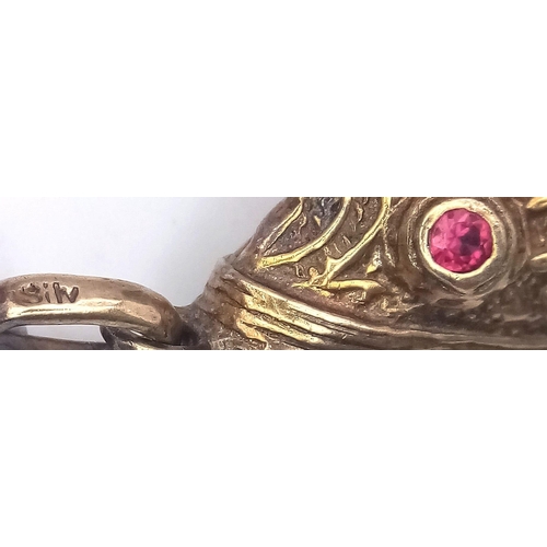 858 - A vintage sterling silver articulated fish pendant with Ruby eyes that converted into snuff box. Tot... 