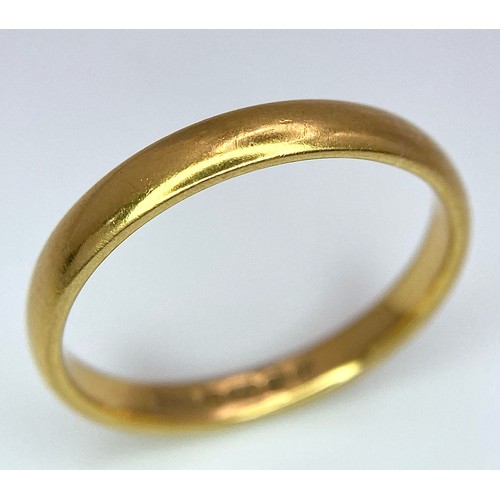 25 - A 22k Yellow Gold Band Ring. 3mm width. 4g weight. Full UK hallmarks.