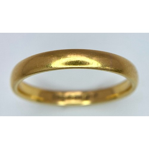 25 - A 22k Yellow Gold Band Ring. 3mm width. 4g weight. Full UK hallmarks.