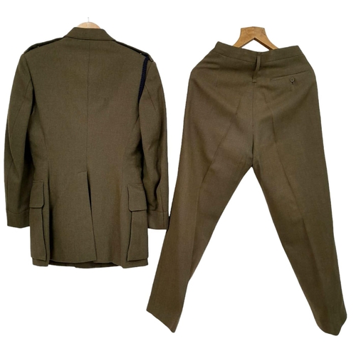 388 - A British Army Officer’s Service Dress jacket and trousers, mid-1960s vintage, with insignia for a L... 