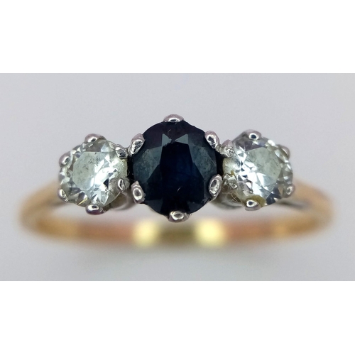 466 - A 9K YELLOW GOLD DIAMOND & SAPPHIRE 3 STONE RING 0.50CT. DIAMONDS 0.45CT SAPPHIRE 3.5G SIZE V 1/2

R... 