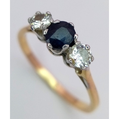 466 - A 9K YELLOW GOLD DIAMOND & SAPPHIRE 3 STONE RING 0.50CT. DIAMONDS 0.45CT SAPPHIRE 3.5G SIZE V 1/2

R... 