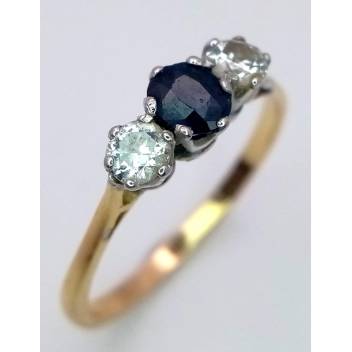 466 - A 9K YELLOW GOLD DIAMOND & SAPPHIRE 3 STONE RING 0.50CT. DIAMONDS 0.45CT SAPPHIRE 3.5G SIZE V 1/2

R... 