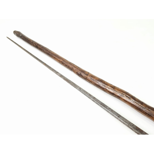 481 - An Antique Wood and Steel Sword Stick. Very Early Example. 93cm Length