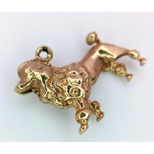 502 - A 9K Yellow Gold French Poodle Pendant/Charm. 2cm. 3.5g weight.