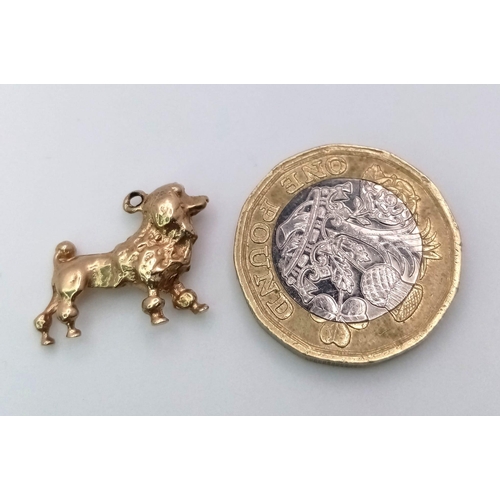 502 - A 9K Yellow Gold French Poodle Pendant/Charm. 2cm. 3.5g weight.