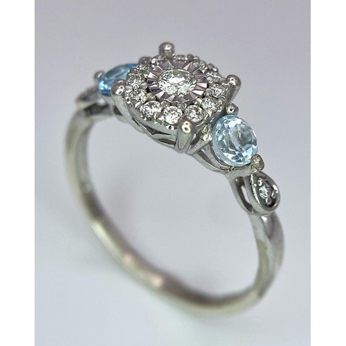 579 - A 9K WHITE GOLD DIAMOND & TOPAZ RING 2G SIZE O

SC 4011