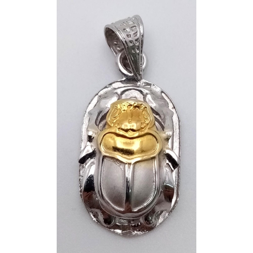 635 - A 9K 2 COLOUR GOLD SCARAB PENDANT 2.5G , 30mm x 13mm

SC 4047