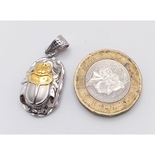 635 - A 9K 2 COLOUR GOLD SCARAB PENDANT 2.5G , 30mm x 13mm

SC 4047