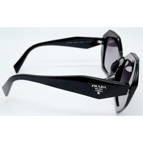 360 - A Pair of Prada Black Geometric Sunglasses. Comes with case, box, cleaning cloth and care booklet. I... 