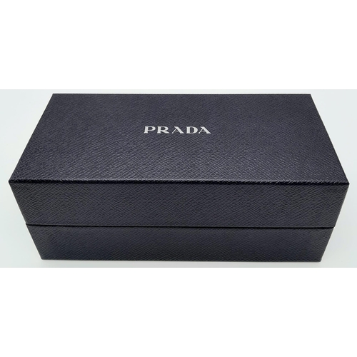 360 - A Pair of Prada Black Geometric Sunglasses. Comes with case, box, cleaning cloth and care booklet. I... 