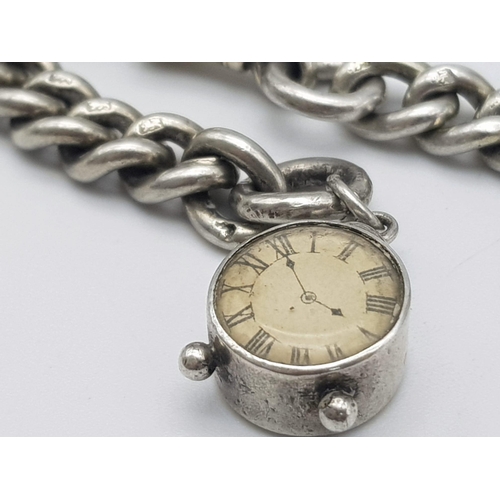 550 - A VINTAGE STERLING SILVER ALBERT POCKET WATCH  CHAIN WITH T BAR AND ALSO A CUTE MINI CLOCK CHARM ATT... 