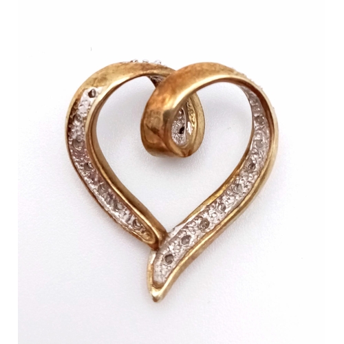 663 - A 9K YELLOW GOLD DIAMOND SET OPEN HEART PENDANT 2.1G , 2cm x 1.8cm

SC 4021