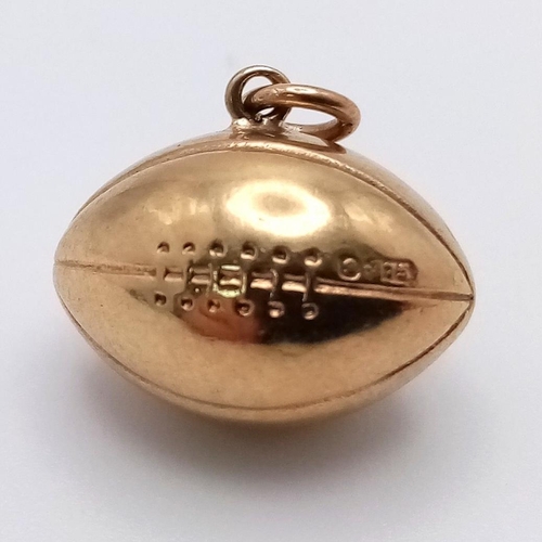 1007 - A 9K YELLOW GOLD RUGBY BALL CHARM 0.7G , 12mm x 14mm

SC 4023