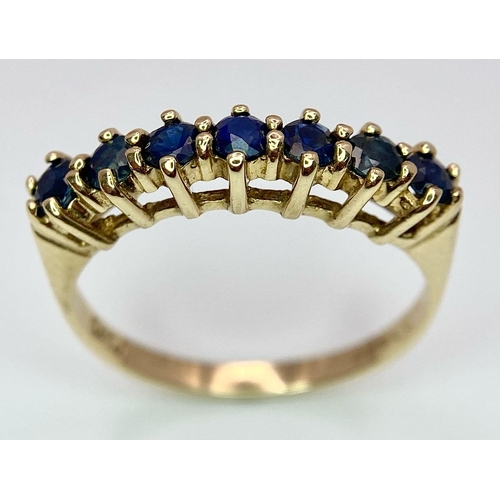 698 - A 9K YELLOW GOLD SAPPHIRE SET BAND RING 2.5G SIZE P

SC 4056